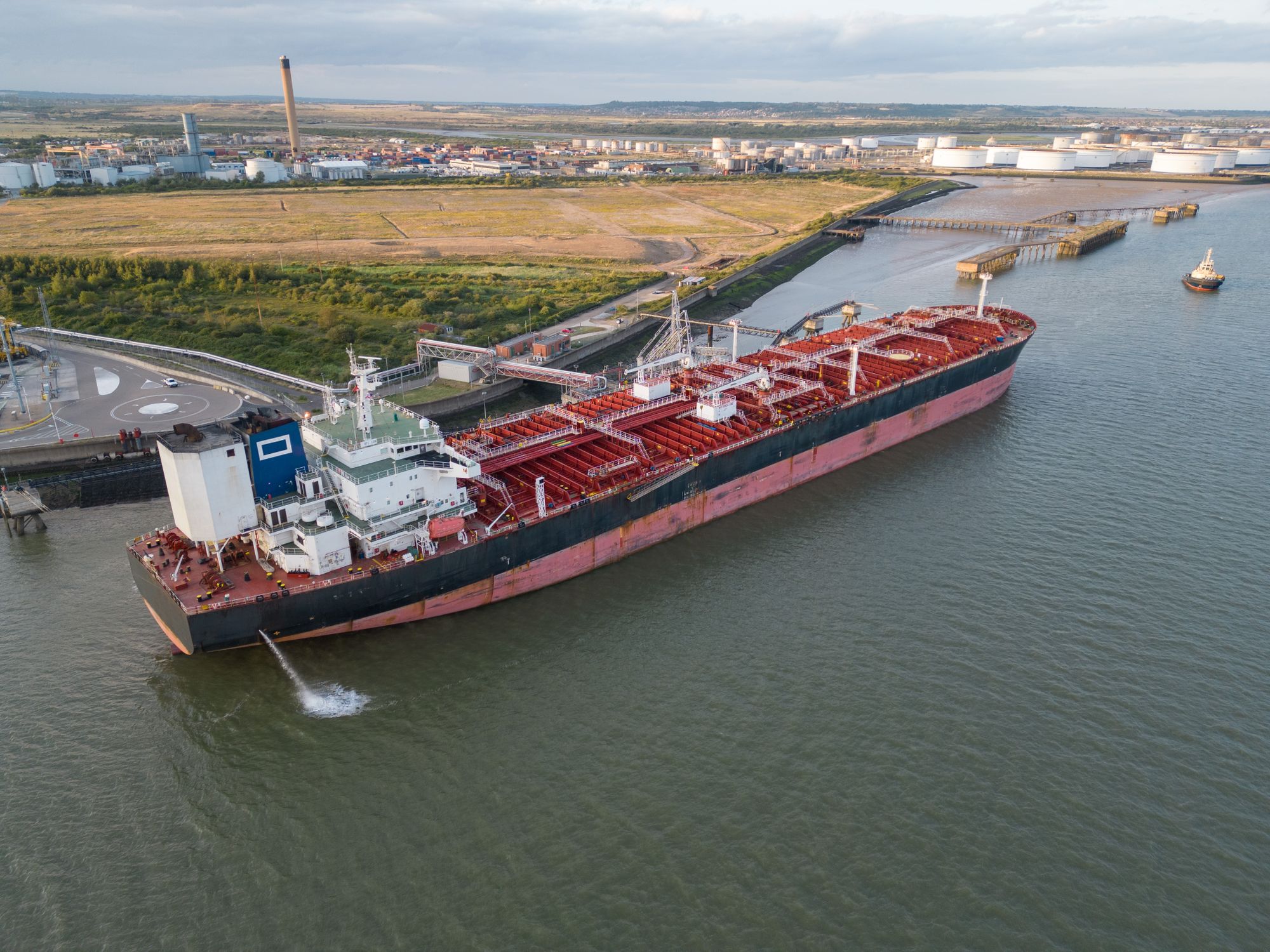 Industrial marine vessel operating at a port